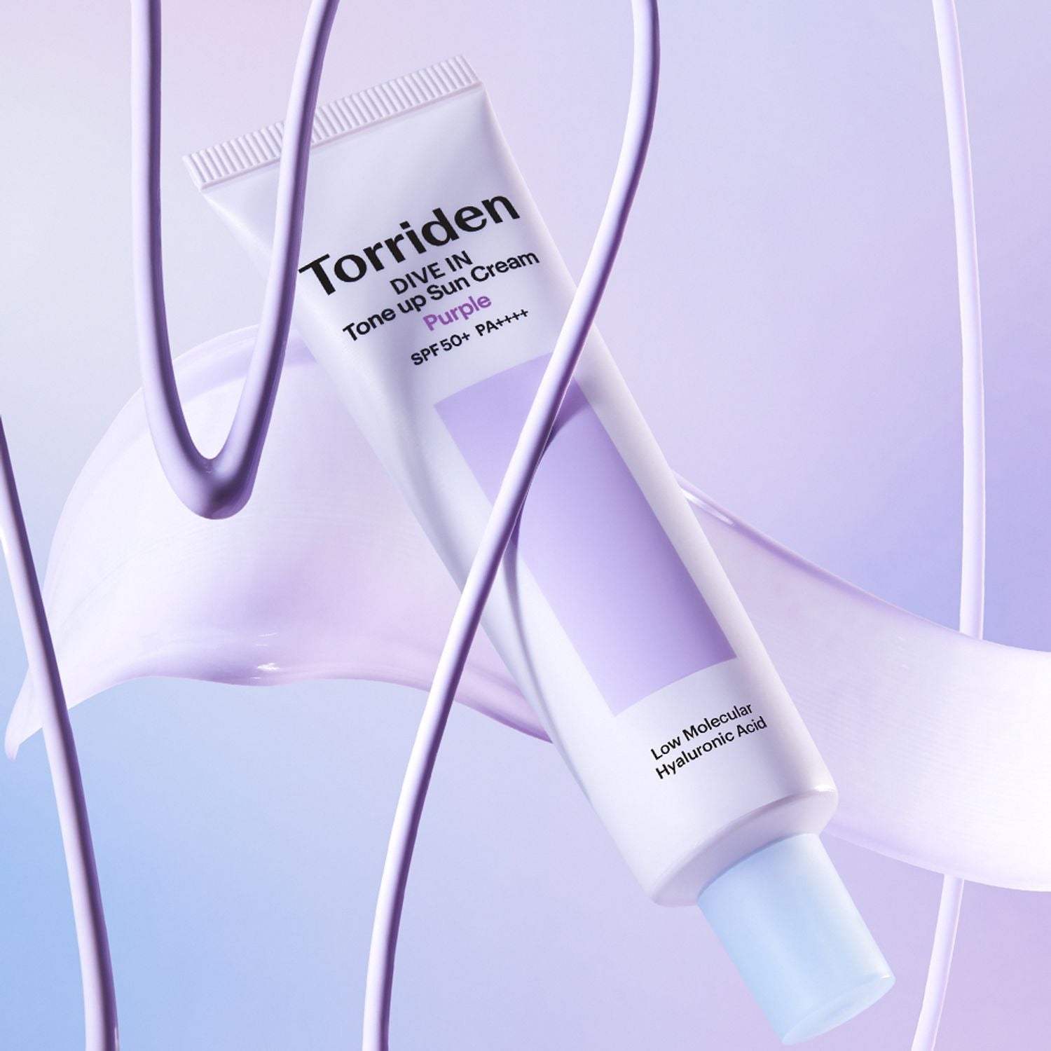 TORRIDEN Dive In Tone Up Sun Cream Purple 50+PA++++ 60ml tube on a lavender background with product highlights visible