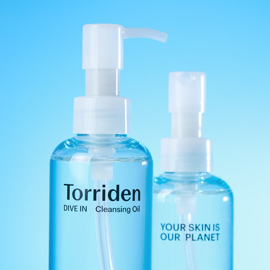 TORRIDEN Dive in Low Molecular Hyaluronic Acid Cleansing Oil 200ml featured in sleek, blue-toned packaging against a light blue background.