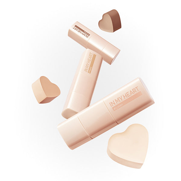 TOUCH IN SOL Pretty Filter In My Heart Stick Foundation with heart-shaped accents on white background