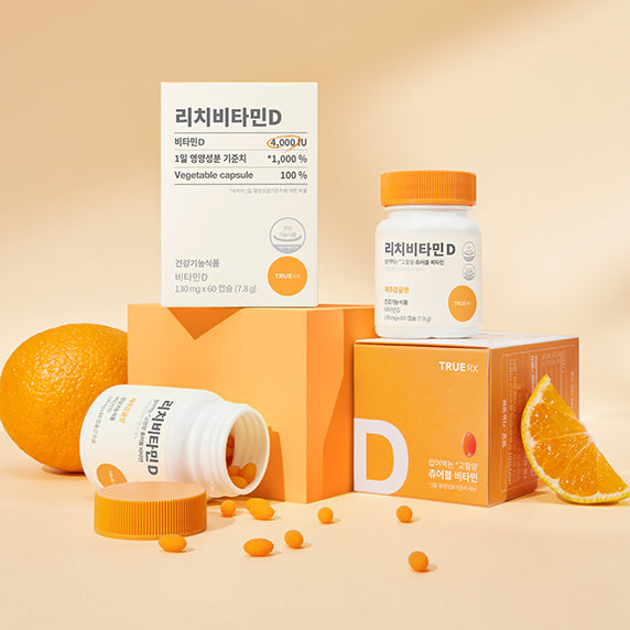 TRUE RX Rich Vitamin D supplement bottles and packaging with orange background