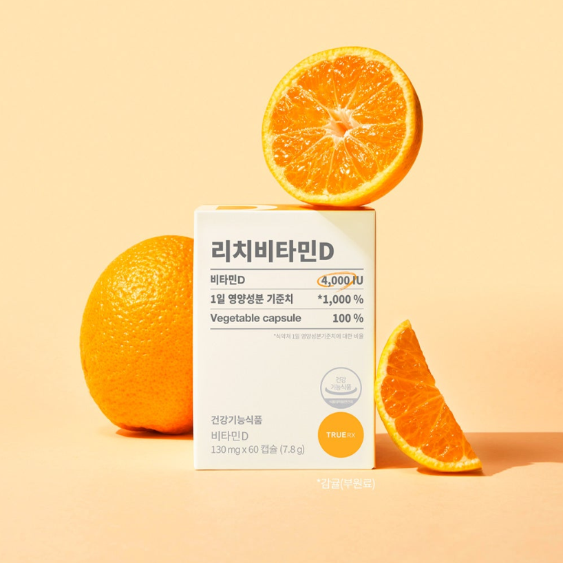 TRUE RX Rich Vitamin D supplement box with fresh oranges