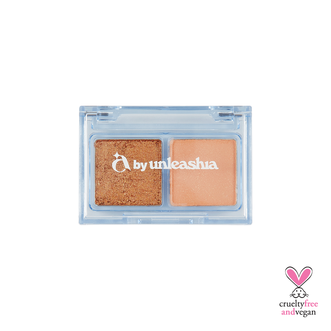 UNLEASHIA Cotton Candy Face Palette with two shimmering shades in a blue compact case.