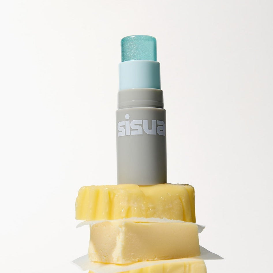 UNLEASHIA Sisua Butter Glow Stick with butter blocks, showcasing the innovative and nourishing beauty product by UNLEASHIA.