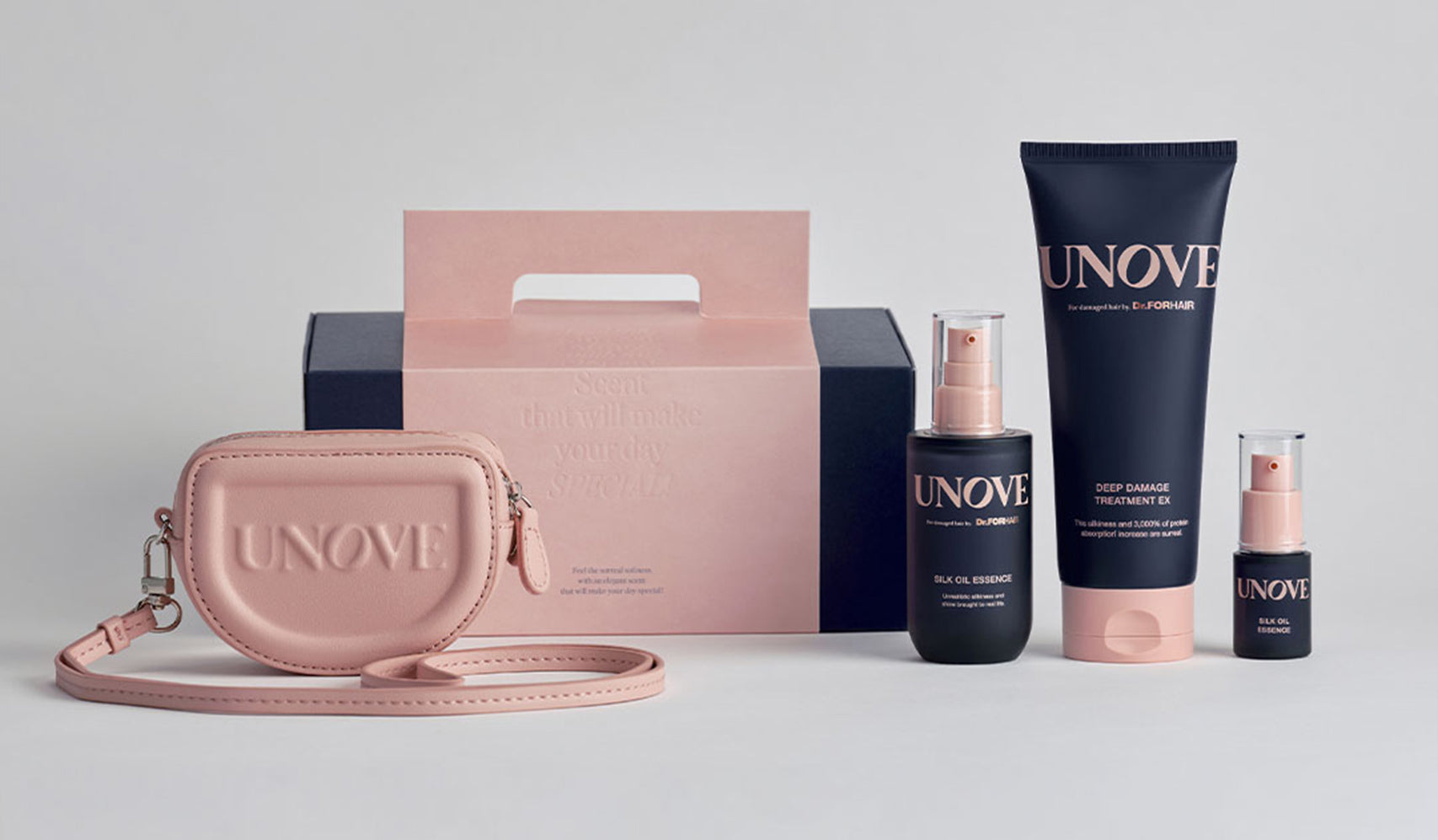 UNOVE skincare products and pink pouch on display, featuring deep repair cream and night serum.