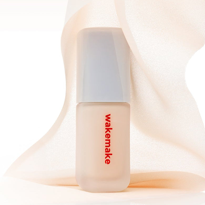 WAKE MAKE Seamless Wear Foundation 30ml bottle with elegant background.