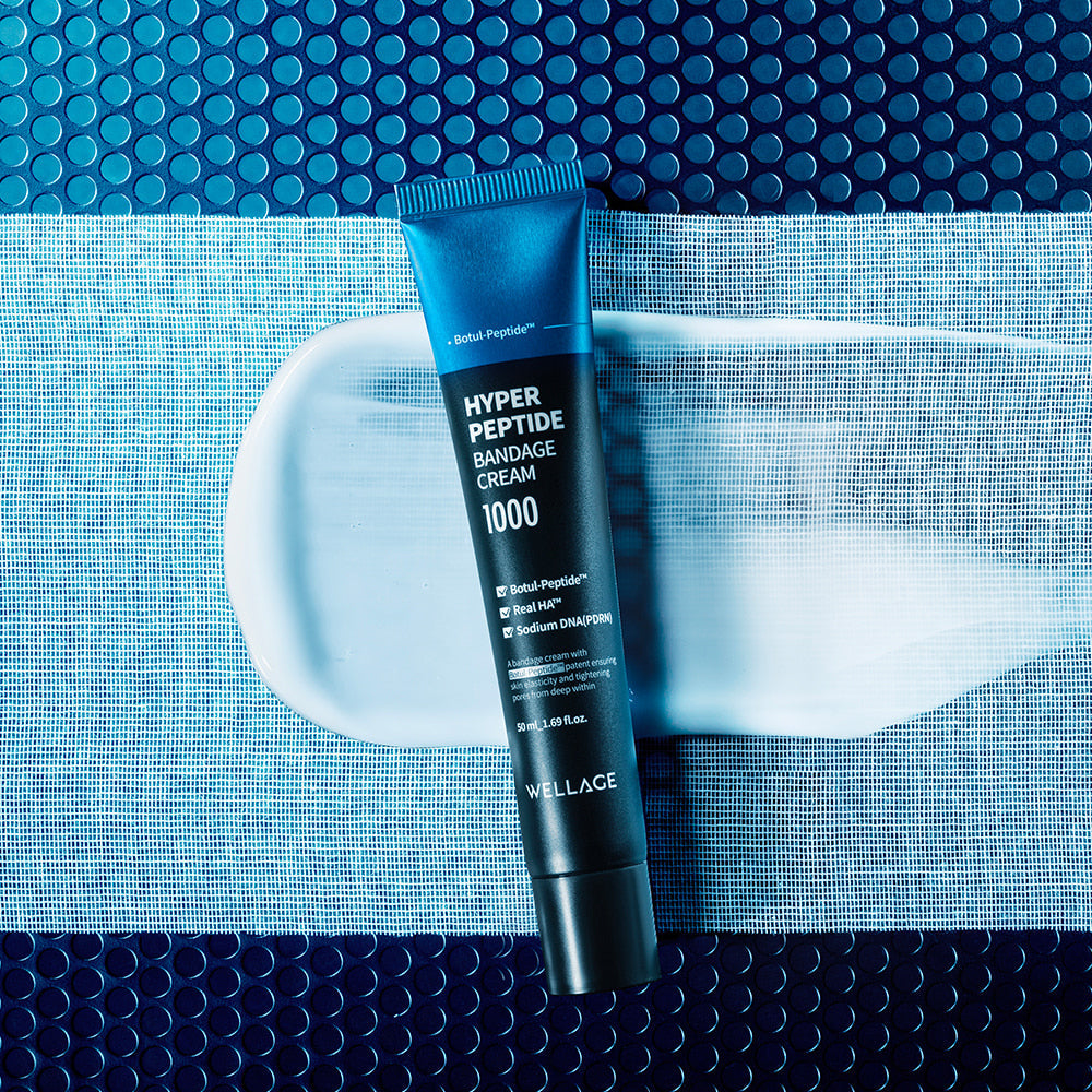 WELLAGE Hyper Peptide Bandage Cream 50ml tube on textured background, showcasing skincare product.