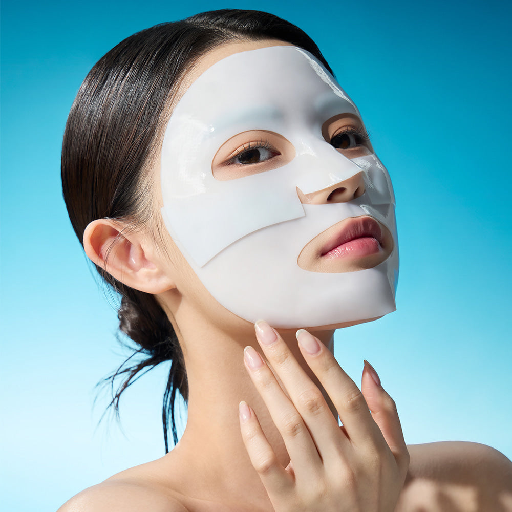 Woman wearing WELLAGE Real hyaluronic Glow Booster PDRN Mask 5 Sheets for skincare