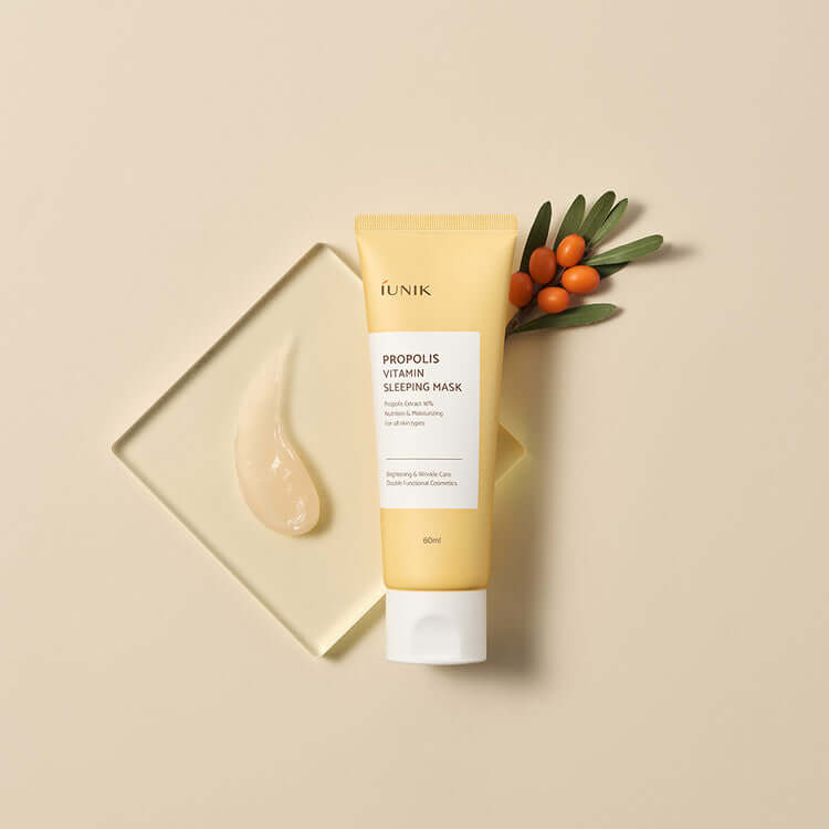 iUNIK Propolis Vitamin Sleeping Mask 60ml tube with sea buckthorn berries on a beige background